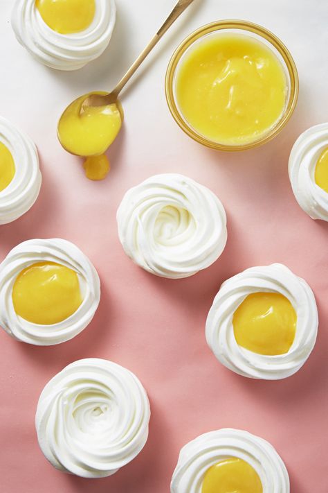 We'll take these meringues, filled with our tangy lemon curd recipe, the way we take our eggs — sunny-side-up, please! Spring Baking Recipes, Easy Easter Cookies, Easter Cookie Recipes, Easy Easter Desserts, Spring Baking, Lemon Curd Recipe, Easter Desserts Recipes, Curd Recipe, Spring Desserts