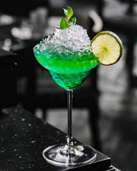 Hypnotic Drinks, Sweet Drinks Recipes, Midori Melon, Melon Liqueur, Sour Mix, Colorful Cocktails, Light Rum, Blue Food Coloring, Ingredient Substitutions