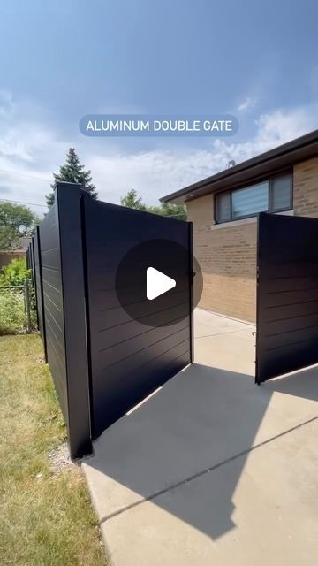 Greenwood Fence™ | Composite + Aluminum on Instagram: "Smooth + good looking, tell your contractor you need a Greenwood Fence aluminum double gate.👇🏼 Do you like this style fence? Comment below. 📍Greenwood Fence HQ — Elmhurst, IL 🛠️: USA only shipping 🎥: @modern_fence_chicago #GreenwoodFence #compositefence #modernfence #privacyfence #DIYfence #aluminum [local fence builder, old post removal, concrete posts, backyard decor, luxury backyard, composite fencing, composite materials, gates, custom gates, aluminum gates, double door gate, wood plastic composite, fencing, fence build, custom fences, home improvement, luxury home ideas]" Fence Front Yard Ideas, Composite Gate Ideas, Aluminum Gates Design, Gate Fence Ideas, Double Gate Fence, Fences And Gates Modern, Modern Fences And Gates, Composite Fence Ideas, Outdoor Fence Ideas