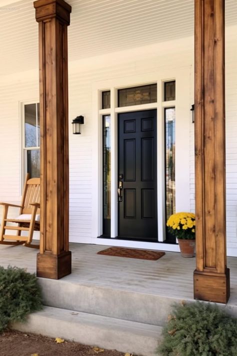 40 Farmhouse Porch Columns To Achieve a Rustic Entryway! Farmhouse Pillars Front Porches, Farmhouse Porch Columns, Front Door Wood, Wood Pillars, Modern Farmhouse Porch, Black Front Door, Wood Porch, Rustic Entryway, Black Front Doors