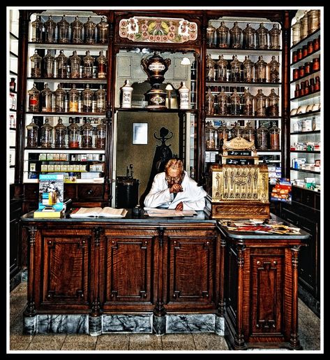 An old pharmacist in the apothecary Apothecary Shoppe, Halloween Coffee Bar, Apothecary Design, Apothecary Pharmacy, Apothecary Decor, Diy Coffee Bar, Coffee Bar Design, Halloween Decoration Ideas, Apothecary Cabinet