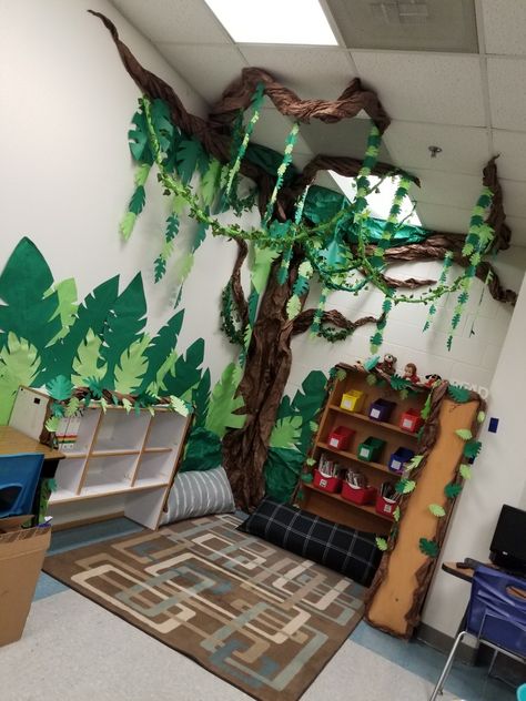 Jungle Infant Classroom, Rainforest Display Classroom, Jungle Reading Corner, Jungle Theme Library, Jungle Book Classroom Theme, Jungle Daycare Theme, Rainforest Classroom Transformation, Rainforest Room Decor, Jungle Classroom Transformation