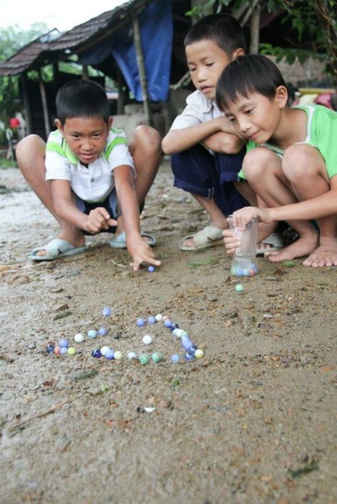 games from around the world -- marbles Games From Around The World, Childhood Photography, Childhood Memories Art, Harmony Day, International Games, Operation Christmas, World Vision, Art Village, World Party