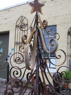 Black Dog Salvage - Architectural Antiques & Custom Designs: The Ideal Christmas Tree - no watering required! Wrought Iron Christmas Tree, Iron Christmas Tree, Unusual Christmas Trees, Pinterest Christmas, Metal Christmas Tree, Metal Yard Art, Metal Christmas, Metal Tree, Christmas Decorations Rustic