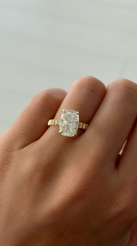 This ring showcases a stunning elongated cushion-cut diamond, balancing modern sophistication with classic charm. As a custom order, you have the opportunity to personalize every detail to reflect your unique love story. Contact us today to discuss your vision and create the perfect piece that captures every sparkle and detail. #engagementring #weddings #proposal #customring Classy Timeless Wedding, Elongated Cushion Cut Ring, Elongated Cushion Cut Engagement Ring, 3 Carat Engagement Ring, Game Wedding, Pretty Engagement Rings, Marriage Material, Ring Cuts, Elongated Cushion Cut