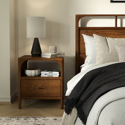 The Cali bed is crafted from solid oak wood and oak veneers. The wood is hand finished with a walnut stain, which adds a warm and rich tone to the piece, and enhances the natural grain patterns of the oak. The bed features a subtle arch detail that ties it into the rest of the bedroom collection. Wooden slats are included so it can be used without a box spring for low, modern feel. Solid Wooden Bed, Oak Bed, Copper Top Table, Oak Nightstand, Wooden Bed Design, Walnut Nightstand, Oak Beds, Outdoor Accent Table, Wooden Nightstand