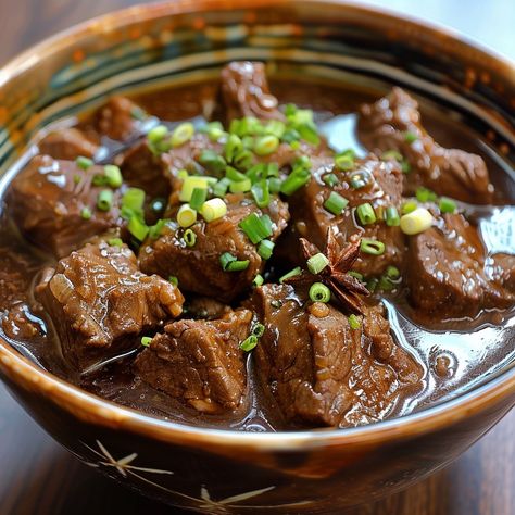 🍛 Enjoy the rich and flavorful Beef Pares, a Filipino favorite! #BeefPares #FilipinoFood Beef Pares Ingredients: Beef brisket (1 lb, cubed) Soy sauce (1/4 cup) Brown sugar (2 tbsp) Garlic (4 cloves, minced) Star anise (2 pieces) Beef broth (2 cups) Cornstarch (1 tbsp, dissolved in 2 tbsp water) Green onions (2, chopped) Instructions: Marinate beef in soy sauce, brown sugar, and garlic for 30 minutes. Cook beef in a pot until browned. Add star anise and beef broth, simmer until beef is ten... Apple Cider Beef Brisket, Saikoro Beef Cube Recipe, Velveting Beef With Baking Soda, Beef Noodle Soup Taiwanese, Taiwanese Beef Noodle Soup, Beef Pares, Cozy Fall Recipes, Marinated Beef, Festive Drinks