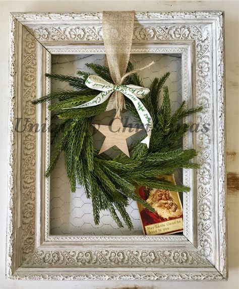 Wreath In Frame Wall Art, Christmas Frame Wreath, Oval Frame Wreath Ideas, Framed Christmas Wreath, Christmas Framed Art, Christmas Crafts Frames Gift Ideas, Rustic Picture Frame Wreath, Old Frames Ideas Wall Art, Old Frame Christmas Decor