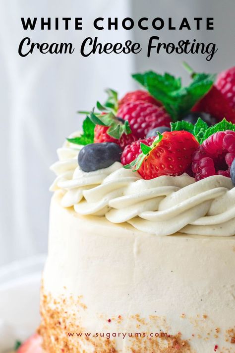 Closeup of cake decorated with cream cheese frosting and topped with berries White Chocolate Cream Cheese Buttercream, White Chocolate Cream Cheese Icing, Cream Cheese Frosting Decorating Ideas, White Cake With Cream Cheese Frosting, Cream Cheese White Chocolate Frosting, Icing Alternative, Frosting Tricks, White Chocolate Cream Cheese Frosting Recipe, Stiff Buttercream Frosting Recipe