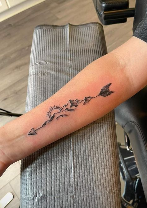 Arrow Nature Tattoo, Men’s Tattoo Ideas Arrow, North Dakota Tattoo Ideas, Fine Line Arrow Tattoos For Women, Arrow Mountain Tattoo, Simplistic Nature Tattoo, Mountain Arrow Tattoo, Crossing Arrows Tattoo, Montana Tattoo For Women