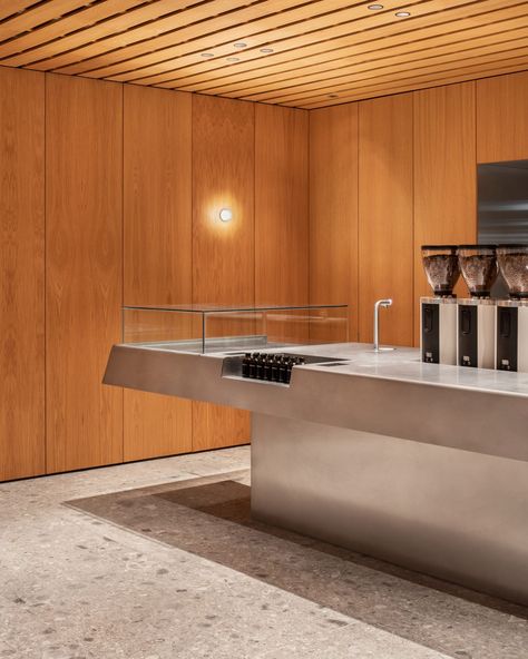 EBBA references modernist architecture at WatchHouse coffee shop Watchhouse Coffee, Parisian Style Interior, Communal Workspace, Tropical Frames, Minimalist Shelves, Modernist Architecture, Stainless Steel Counters, Kitchen Candles, Timber Panelling