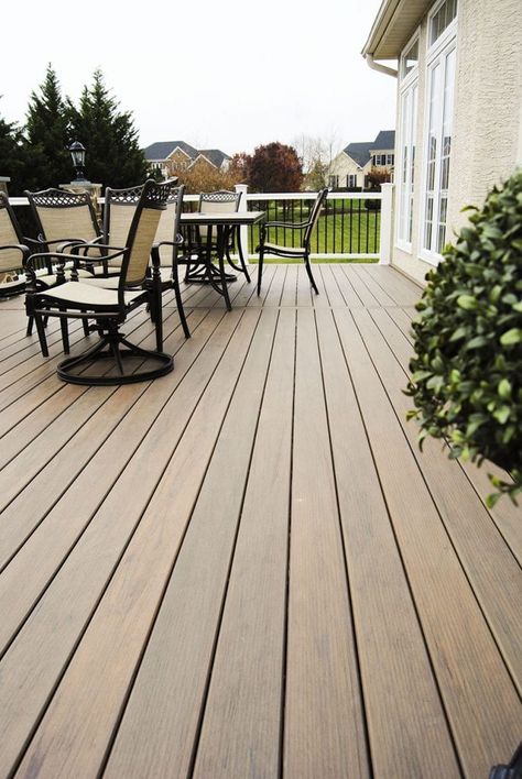 Deck color with taupe houses  #deckskirtingideas #deckideas #CompositeDecking #CompositeDeck #DeckingSystem #Deckstore Deck Color Schemes, Solid Stain Deck, Wood Deck Stain, Deck Paint Colors, Composite Decking Colors, Deck Upgrade, Deck Stain Colors, Deck Renovation, Tan House