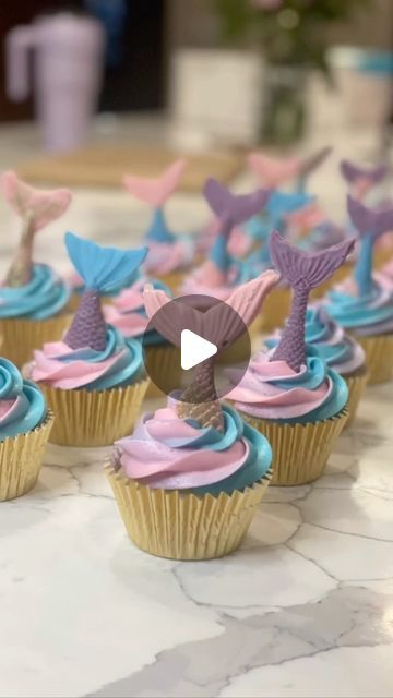 Lisa Meeker on Instagram: "Coralee loves to help me bake! It takes twice as long but it is worth every second. #mermaidcupcakes #colorfulcupcakes #kidsbaking #girlbirthdaycupcakes #birthdaycupcakes #kitchenhelper #bakinghelper #mermaidbirthday" Mermaid Cakes And Cupcakes, Mermaid Cupcake Ideas, Easy Mermaid Cupcakes, Mermaid Birthday Cupcakes, Mermaid Cupcakes Ideas, Number 3 Mermaid Cupcake Cake, Simple Mermaid Birthday Cake Diy, How To Make A Mermaid Tail Cupcake Cake, Mermaid Cupcake Cake