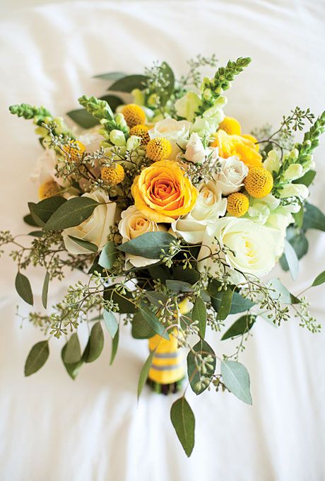 This bouquet features craspedias, snapdragons, roses, and eucalyptus. Photo by Akil Bennett. Yellow Bridal Bouquets, Yellow Wedding Bouquet, Yellow Wedding Inspiration, Yellow Wedding Theme, Yellow Bouquets, Yellow Wedding Flowers, Flowers And Greenery, Cat Air, Yellow Wedding