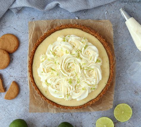 Key Lime Pie - The filling is super zingy and I’ve topped the pie with whipped cream to set off the sour lime. The Baking Explorer Key Lime Pie Decoration, Lime Loaf Cake, Lime Loaf, Ginger Nut Biscuits, Dessicated Coconut, American Dessert, Whipped Cream Topping, Nutella Buttercream, Pie Decoration