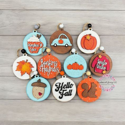 Embrace the beauty of fall with hand-painted autumn ornaments and rustic decorations perfect for celebrating the changing seasons! Autumn Ornaments, Cameo Crafts, Fall Ornaments, Silhouette Cameo Crafts, Teacher Ornaments, Fall Thanksgiving Decor, Painted Christmas Ornaments, Fall Decoration, Wood Slice Ornament