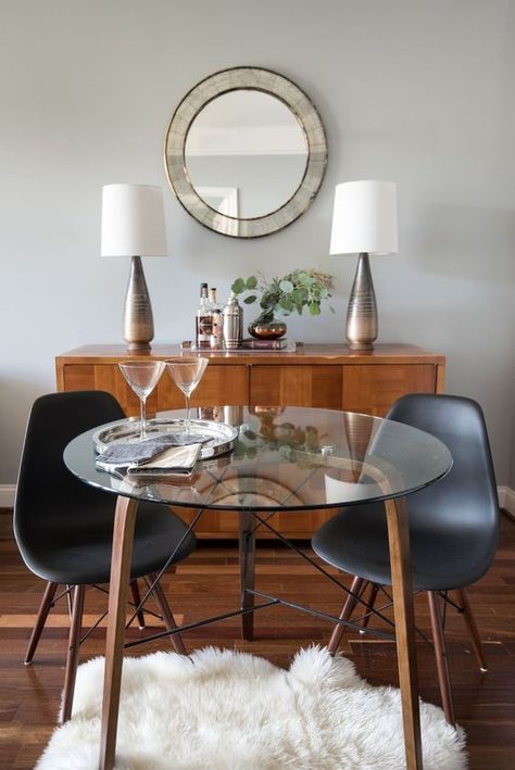 Glass tables and mirrors make small rooms feel lighter and bigger. Five Elegant Solutions for Small Spaces - Bachelor Pad Dining Room, Round Glass Kitchen Table, Small Glass Dining Table, Glass Dining Table Designs, Glass Table Living Room, Modern Glass Dining Table, Glass Kitchen Tables, Glass Dining Room Table, Glass Round Dining Table