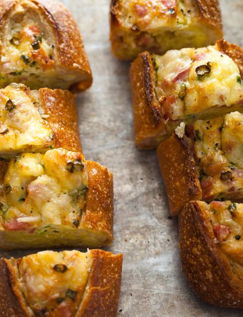 I can not wait to make these again.  I made them one morning for a house full of company and everyone raved about them!  These egg boats are the most delicious savory breakfast treat!  The outside is crusty and crispy, while the inside is soft and custardy...YUM!  The best part is that you can flavor them with whatever you want. Egg Boats, Spoon Fork Bacon, Baked Egg, Deli Sandwiches, Snacks Für Party, Spoon Fork, Baked Eggs, French Bread, Breakfast Brunch Recipes