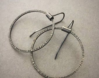 Crow Design Studio by CrowDesignStudio on Etsy Jewelry Texture, Hammered Metal Jewelry, Modern Silver Earrings, Wire Jig, Black Leather Cuff Bracelet, Silversmithing Jewelry, Hammered Jewelry, Hammered Hoop Earrings, Soldering Jewelry