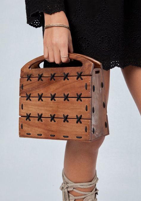 Compact, boxy wood clutch with black contrast cross stitching and wood handles. Cotton dust bag/interior liner included Self: 100% Wood,... Hand Bags Ideas, Wooden Clutch, Wooden Purse, Wooden Bag, Bags Ideas, Designer Clutch Bags, Wooden Accessories, Leather Art, The Tote Bag