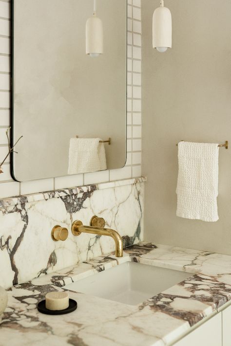 This Cool Teen Bathroom Features Bold Marble in 5 Different Spots Bathroom Backsplash Ideas Vanities, Teen Bathroom, Porcelain Tub, Glass Blocks Wall, Teen Bathrooms, Vanity Backsplash, Luxe Bathroom, Bathroom Transformation, Primary Bath