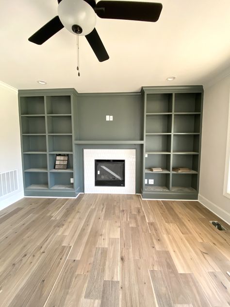 SW Homburg Gray (sw7622)  On built ins Fireplace Built Ins Color, Sw Homburg Gray Cabinets, Dark Green Built Ins Fireplace, Green Built Ins Fireplace, Paint Color For Built Ins, Fireplace Bookcase Built Ins, Gray Built Ins Living Room, Green Built Ins Living Room, Painted Built Ins Fireplace