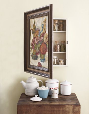 Hidden cabinet storage behind a vintage (or not) painting. This could be cute for many types of storage. I'm loving this example of using it for spices because I need a good space to keep mine that isn't stuffed up in a high cabinet where they're harder to easily access. Diy Home Decor For Apartments, Hidden Cabinet, Inexpensive Crafts, Cheap Crafts, Diy Decor Crafts, Vintage Cabinets, Household Furniture, Modern Bed, Ideas Living