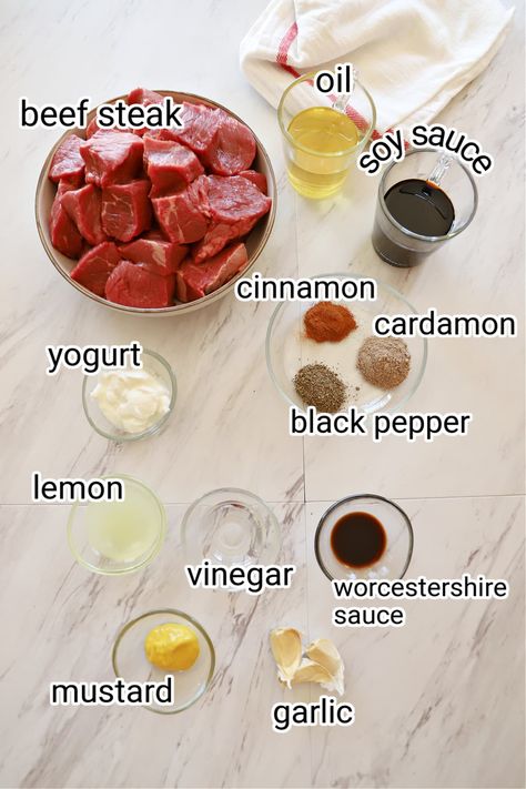 Ingredients for shish kebab on a white surface. Beef Shish Kabob Marinade, Shish Kabob Marinade, Steak Kebab Recipes, Steak Kebab, Beef Shish Kabob, Middle Eastern Recipes Arabic Food, Shishkabobs Recipe, Beef Kebab, Kebabs Skewers