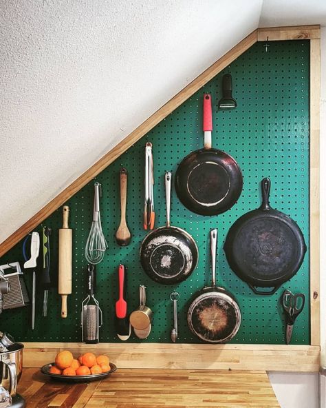 green pegboard on a small wall filled with pans and cooking utensils Small Cabin Organization Ideas, Diy Kitchen Storage Ideas For Small Spaces, Small Kitchen Pots And Pans Storage, Diy Small Apartment Ideas, Wall Kitchen Organization, Diy Kitchenette Small Spaces, Small Kitchen Ideas Color, Colorful Small Kitchen, How To Organize A Small Kitchen