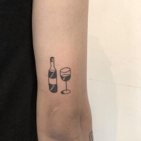 Wine bottle and glass tattoo by yeahdope inked on the right triceps Wine Tattoos, Wine Glass Tattoo, Wine Tattoo, Glass Tattoo, Plane Tattoo, Unique Tattoos For Men, Wallpaper Matching, Tato Minimal, Cup Tattoo