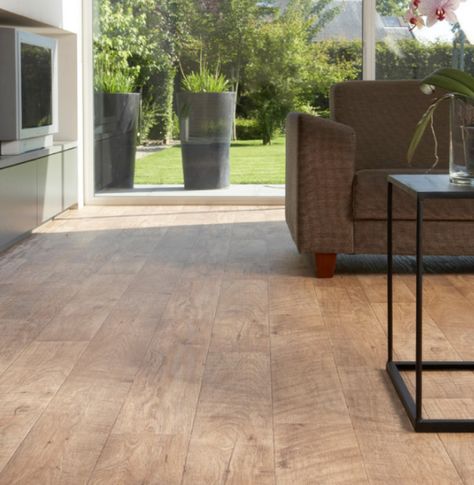 ide range of price points. They provide the same warm look as real hardwood but without the maintenance. Because of their moisture-resistant wear layers, the durable flooring can be installed in just about any room, including wet areas like bathrooms, kitchens, and laundry rooms. Cleaning is simple with a good sweep from a soft-bristled broom or vacuum, and food stains can be wiped up with a little baking soda paste and non-abrasive sponge. Luxury Vinyl Planks, Vinyl Planks, Radiant Floor Heating, Food Stains, Flooring Store, Durable Flooring, Waterproof Flooring, Heated Floors, Radiant Heat