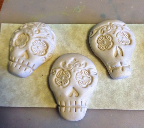 Happy Halloween! Feliz Dia de los Muertos! Dia de los Muertos ofrenda table, San Diego. Photo by J. Davies-Reazor last years skulls... Ofrenda Table, Sugar Skull Clay, Clay Sugar Skull, Skeleton Heads, Clay Skull, Skull Crafts, Day Of The Dead Art, Metal Clay Jewelry, Leather Stamps