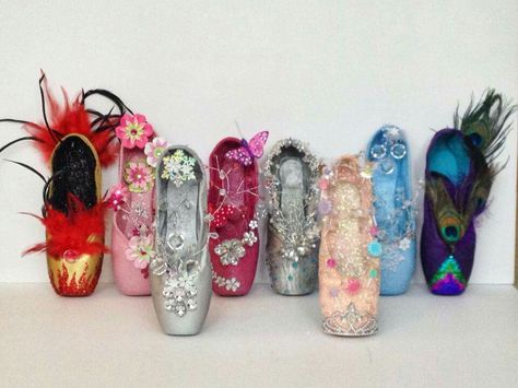 Decorate old pointe shoes and auction off as a studio fundraiser. How To Decorate Pointe Shoes, Old Pointe Shoe Ideas, Pointe Shoe Decorations Ideas, Decorated Pointe Shoes Nutcrackers, Decorating Pointe Shoes, Pointe Shoes Decoration, Ballet Sketch, Decorate Pointe Shoes, Pointe Shoes Decorated