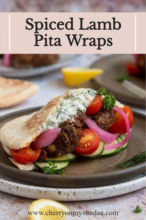 These spiced lamb pita wraps are anything but boring. Lamb burgers sandwiched with a sizzling herb yogurt sauce and pickled onions. #pitawraps #lunchideas #healthylunch #lambrecipe Lamb Pita Pockets, Herb Yogurt Sauce, Lamb Pita, Lamb Wraps, Lamb Taco, Pita Wraps, Lamb Patties, Spiced Lamb, Homemade Pita Bread