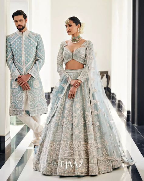 Bride Story on Instagram: “The dreamy icy blue lehenga and sherwani is the ideal assortment of modern elegance and a timeless tale for summertime soirée. All the…” Indian Bride Wedding Dress, Day Wedding Outfit Indian, Engagement Lehengas For Bride, Interracial Indian Wedding, Bridal Reception Dress Indian, Indian Wedding Couple Outfits, Bride And Groom Indian Wedding Outfit, Reception Dress Bride Indian, Wedding Matching Outfits