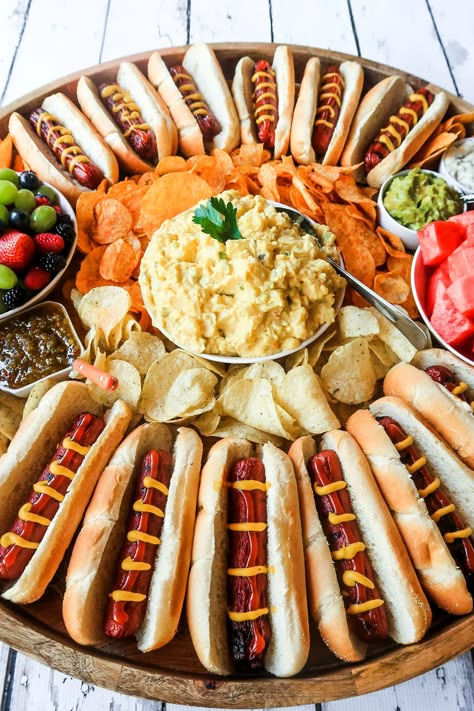 Epic Hot Dog Board for Twelve #epichotdogboard #hotdogs #hotdogboard Hot Dog Board, Hot Dog Party, Sour Cream Potatoes, Charcuterie Inspiration, Party Food Platters, Charcuterie And Cheese Board, Charcuterie Recipes, Snacks Für Party, Dog Party