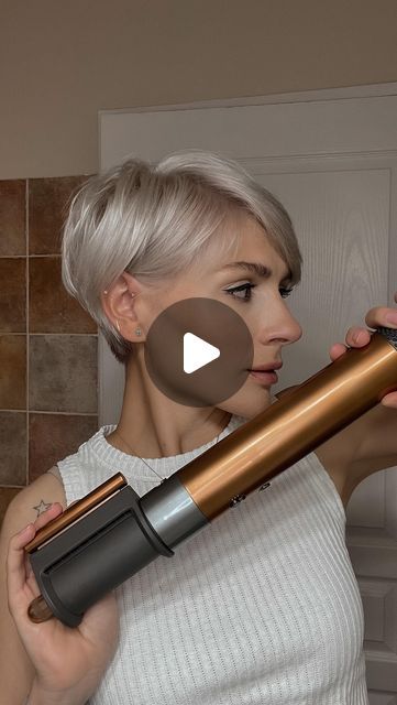 Iryna Gamess on Instagram: "✨ how I style my short hair ✨ ⠀ Short and fast video of “how I style my hair” with @dysonhair_fr Airwrap, which I am using since Chrismas. ⠀ #dysonhair #dysonairwrap #dysonfrance #mydyson #dysonhairpro #shorthaircut #shorthairstyle #shorthairstyle" Curling Very Short Hair, "bixie" Haircut Styling, Short Hair Styling Videos, How To Style A Short Bob Haircut, Short Hair Growing Out, How To Style Short Hair With Layers Tutorials, Air Wrap Short Hair, How Style Short Hair, Short Blonde Hair With Shadow Roots