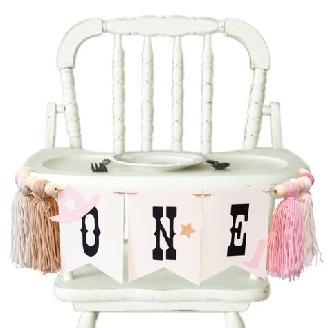 PRICES MAY VARY. ADORABLE WESTERN CHARM :Celebrate your baby girl's first birthday with the perfect touch of cowboy whimsy. This fringe highchair banner features delightful pink cowboy hats, boots, and stars on three cardstock pieces, creating an adorable representation of the special "ONE" milestone. CRAFTED WITH DETAIL:Each element is carefully crafted, with black "ONE" atop the cardstock pieces, complemented by khaki, beige, and blush pink tassels separated by charming wooden beads. The atten Long Live Cowgirls Birthday Party, Baby’s First Rodeo Birthday Theme Girl, Western First Birthday Girl, Rodeo First Birthday Party, My First Rodeo Birthday Girl, First Rodeo Birthday Party Girl, Baby Girl First Birthday Theme, My First Rodeo Birthday, Highchair Garland