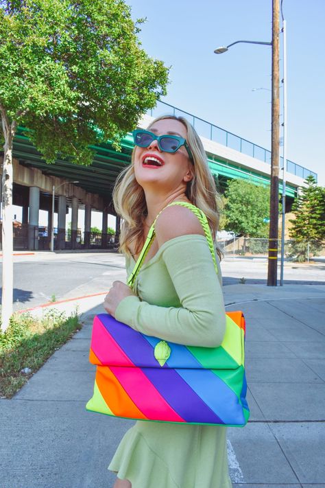 rainbow bag, cut out dress, spring dresses, braided leather heels, The Hunter Collector, colorful style, spring outfit ideas, green dress, green heels, green sunglasses Colorful Bags Outfit, Karl Bags, Best Purses For Everyday, Colourful Closet, Rainbow Purses, Heels Green, Purse Outfit, Multi Colored Bag, Kids Purse