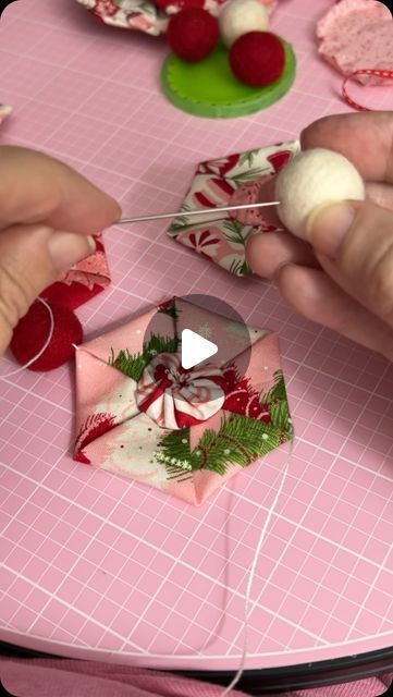 Nic 🪡 Quilt Pattern Designer 🧵 ❤️🥰 Hand piecing + applique on Instagram: "🥰 Join me for a fun Christmas in July sewalong kicking off tomorrow!  🎄 We’ll sew folded hexagons and yo-yos to make sweet ornaments and a garland. There will be video instructions included to show how to make yo-yos, folded hexagonal and how to construction the ornaments and a garland.  🎄 The HexaYoJoy pattern is on sale for 15% off. Use HEXY at checkout to save.  🎄 I’m using Once Upon a Christmas fabric by @sweetfireroad it’s adorable. It’s also available at @missouriquiltco and with my partner discount orders USD$50 and over receiver 20% off. Some exclusions apply. Comment SAVE and I’ll DM you my discount link. Discounts will show at checkout.  🎄 Comment HEY HEXY and my automation will send you a link with Yo Yo Garland, Yo Yo Christmas Ornaments, Quilted Ornaments Christmas, Epp Christmas Ornaments, Folded Fabric Ornaments Free Pattern, Folded Hexagons, Christmas Pillows To Make, Fabric Yoyo, Holiday Quilt Patterns