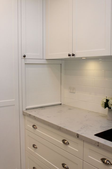 Kitchen - Roller Door Appliance Cupboard.  Used the "dead" corner of the kitchen for the appliance cupboard, but used area above appliance cupboard and below bench as storage shelves and drawers accessed from the WIR on the other side of the wall.  A much better use and more accessible way to use this space. Gully Kitchen, Appliance Garage Ideas, Appliance Cupboard, Appliances Garage, Kitchen Corner Cupboard, Pantry Renovation, Kitchen Cabinets Color Combination, Kitchen Sink Window, Roller Door