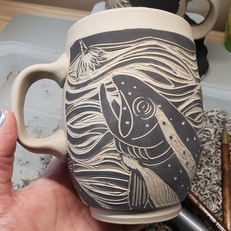 Leslie Krist on Instagram: “New Design:Trout #newwork #trout #fishing #wip #sgraffito #handmademug #madeinmichigan #michiganartist #terrapintileandpottery #gofishing” Sgraffito Fish Designs, Ceramics Sgraffito, Sgraffito Ideas, Sgraffito Designs, Pottery Sgraffito, Sgraffito Pottery, Ceramic Glazing, Coil Pots, Ceramics Art