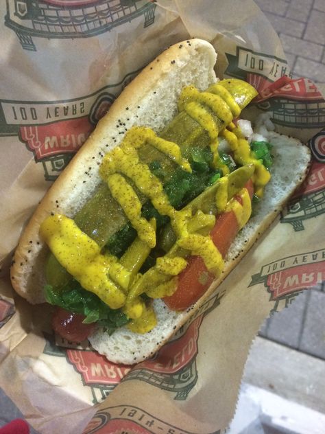 Chicago style hot dog at wriggly field, decade dog. Beef hot dog with tomatoes wedge, pickle spear, relish, onions, yellow mustard, sport peppers, and celery salt, on a poppy seed bun Wriggly Field, Sport Peppers, Chicago Style Hot Dog, Celery Salt, Beef Hot Dogs, Chicago Style, Poppy Seed, Yellow Mustard, Dog Eating