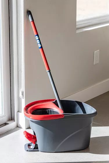 Spin Mop Cleaning Solution That Cleans Floors Like Crazy Tutorial | Hunker Best Homemade Mopping Solution, Moping Floors Cleaning, Spin Mop Cleaning Solution Diy, Spin Mop Floor Cleaner Recipe, Floor Mopping Recipes, Mop Bucket Cleaning Solution, Best Way To Mop Floors, Best Way To Clean Floors, Best Mopping Solution For Hardwood