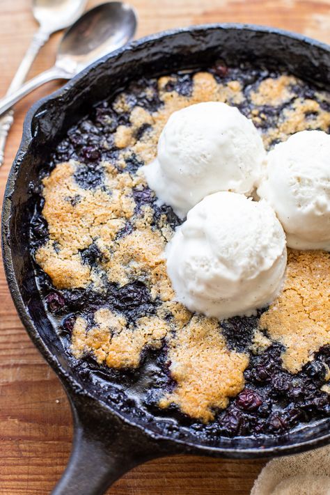 When you have a bounty of blueberries, you have to bake this Gluten-Free Blueberry Cobbler! It's made with wholesome ingredients like almond flour and sweetened with maple syrup. This gluten-free and vegan cobbler recipe is ready to serve in less than an hour. Vegan Blueberry Cobbler, Gluten Free Blueberry Cobbler, Vegan Cobbler, Blueberry Cobbler Recipes, Vegan Blueberry, Blueberry Cobbler, Cobbler Recipe, Gf Desserts, Healthy Gluten Free Recipes