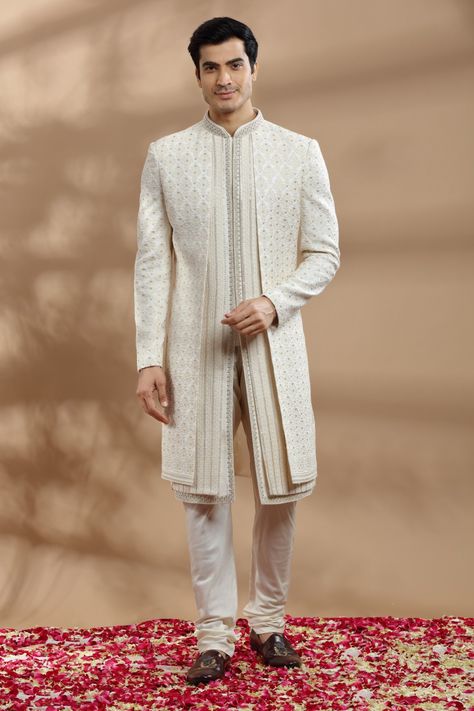 Ivory Hand embroidered double layred Sherwani in resham threads, beads and sequins work. Ivory Sherwani Grooms, Ivory Sherwani, Pants Embroidery, Indian Groom Dress, Groom Sherwani, Wedding Kurta For Men, Groom Dress Men, Wedding Dresses Men Indian, Groom Photoshoot