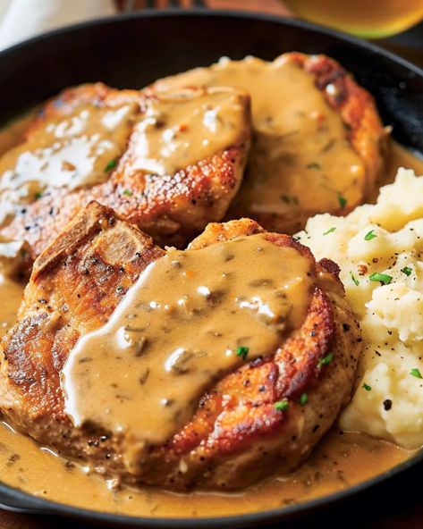 Smothered Pork Chops - Home Chef World The Tipsy Housewife Pork Chops, Black Pepper And Paprika Smothered Pork Chops, Easy Meat Entrees, Dinner Favorites Main Dishes, Pork Chop Recipes Southern, Recipes Using Cooked Shredded Pork, Cooktop Cove Pork Chops, Pork Chops With Spaghetti Sauce, Southern Smothered Pork Chops 12 Tomatoes