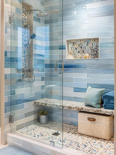 91 Luxurious and Creative Bathroom Tile Ideas Coastal Shower Floor Tile, Modern Beach House Bathroom Ideas, Seaglass Tiles Bathroom, Beachy Shower Tile Ideas, Blue Master Bath Ideas, Waterfall Tile Shower Design, Aqua Tile Bathroom, Colorful Shower Tile, Coastal Shower Ideas