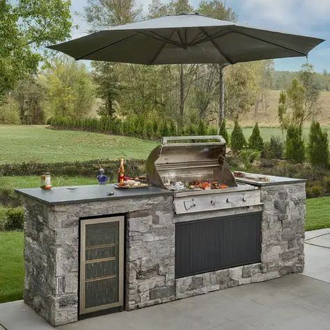 10 Best Outdoor Grill Station Ideas - DIYCozy: Nails, Decor, DIY, Gardening, Holidays Simple Outdoor Kitchen Blackstone, Umbrella Over Grill, Blackstone Outdoor Kitchen Ideas Diy, Outdoor Grill Area Diy On A Budget, Blackstone Outdoor Kitchen, Diy Outdoor Grill Station, Outdoor Grill Area Diy, Modern Outdoor Grills, Pergula Ideas