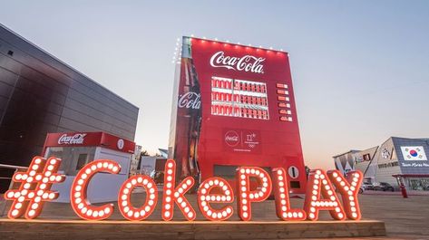 Olympic sponsor Coca-Cola's giant vending machine in Gangneung is proving to be a hit attraction in its own right, with Korean celebrities making pitstops at the commercial landmark to bid South Korean athletes good fortune. (Image: Coca-Cola) Event Vending Machine, Pepsi Booth Design, Coke Vending Machine, Interactive Vending Machine, Futuristic Vending Machine, Photo Zone, Interactive Walls, Experiential Marketing, Guerilla Marketing